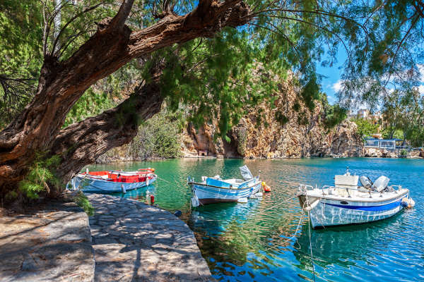 boats on the lake voulismeni, agios nikolaos, crete